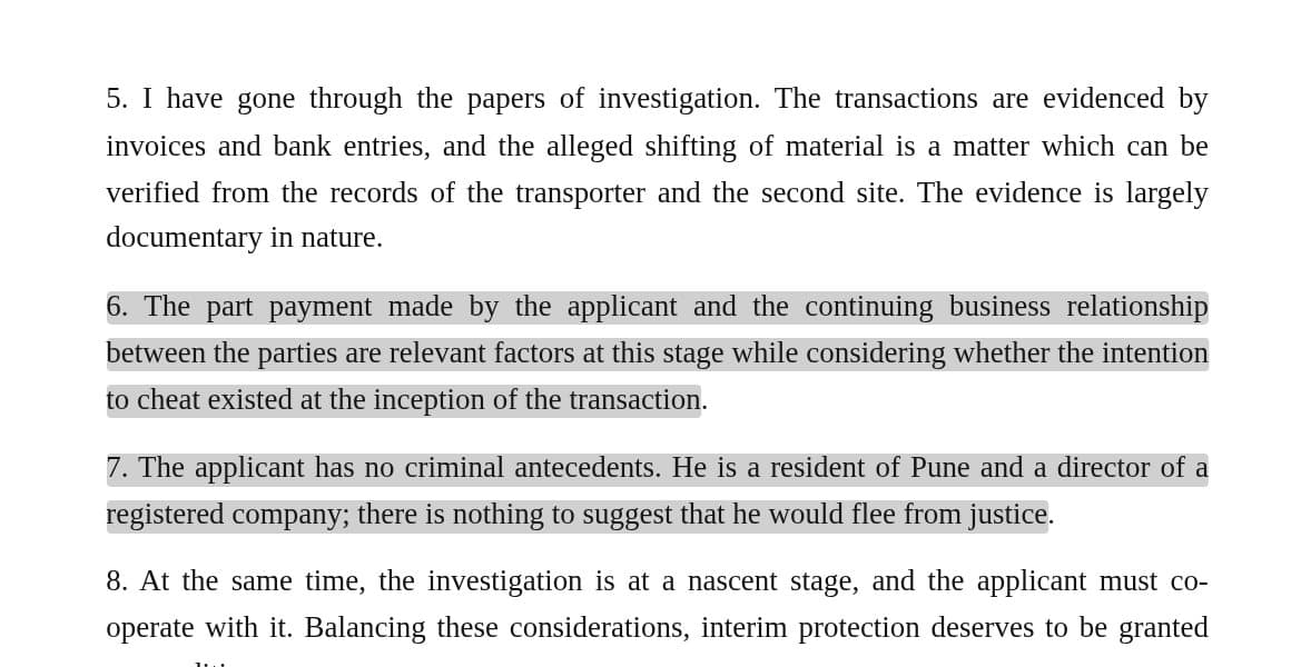 An answer on anticipatory bail grounds beside the interim order it cites, opened at the highlighted paragraphs.